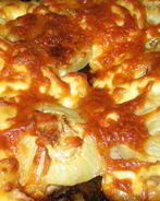 Свинина по-французски с сыром и луком