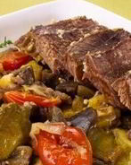 Баранина с овощами запеченная