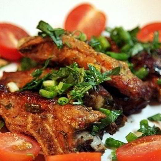 Маринованные ребрышки в духовке