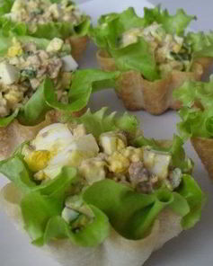 Тарталетки с печенью трески и яйцом